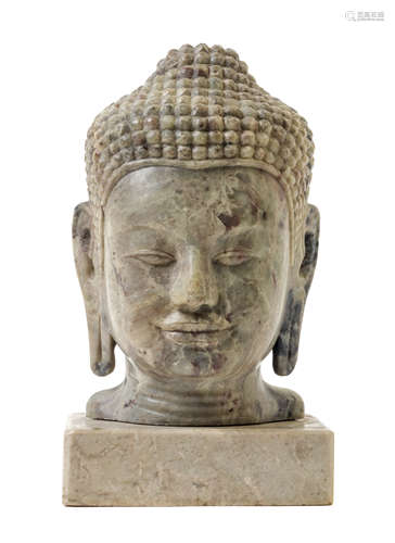 A Carved Hardstone Head of Buddha