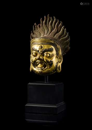 A Sino-Tibetan Gilt Bronze Head of Bodhisattva Mahakala