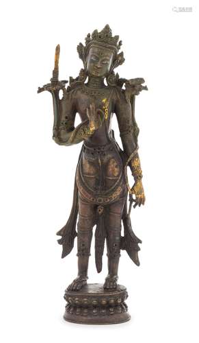 A Sino-Tibetan Parcel Gilt Bronze Figure of Bodhisattva Manjusri Height 12 1/2 inches.