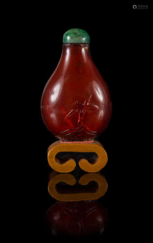 A Carved Amber Snuff Bottle