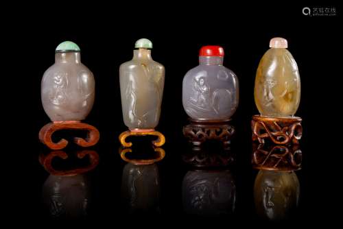 Four Carved Agate Snuff Bottles