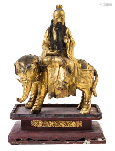 A Gilt Wood Figure of a Daoist Immortal