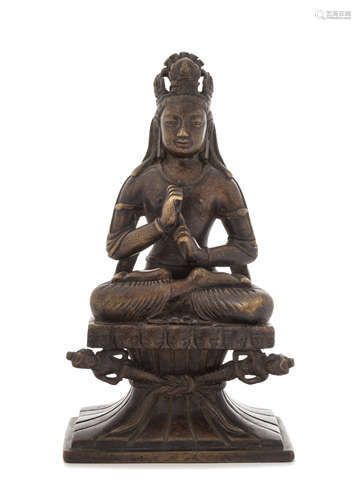 A Bronze Figure of a Deity