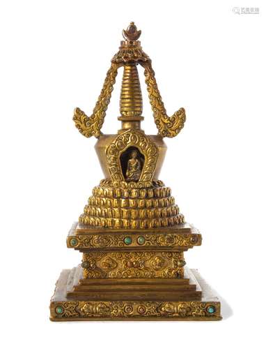 A Tibetan Hardstone Inset Gilt Bronze Stupa