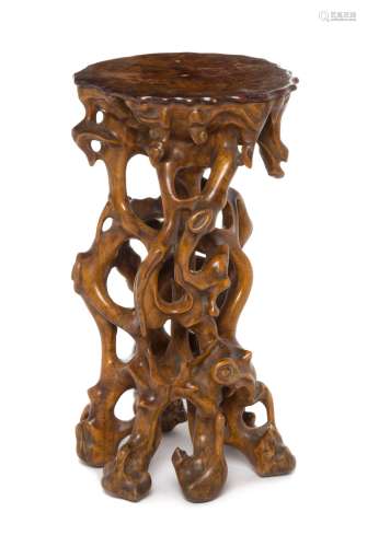 A Carved Mixed Wood Root-Form Stand