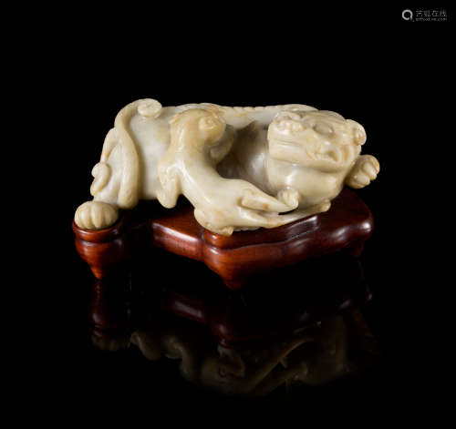 A Carved Hardstone Figural Group of Mythical Beasts