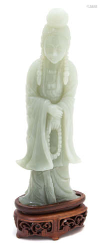 A Carved Celadon Jade Figure of Guanyin