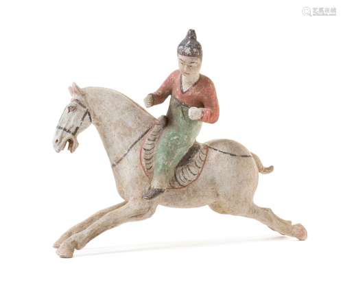 A Painted Pottery Equestrian Figure