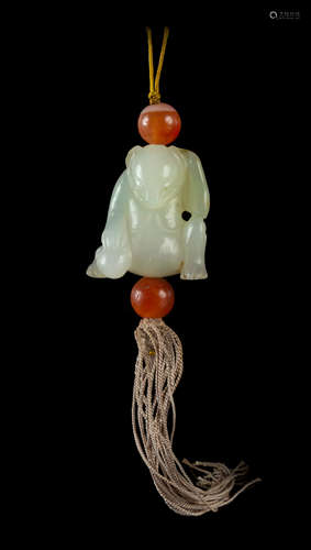 A Carved White Jade Figure of a Bear