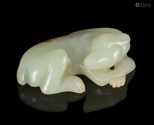 A Carved White Jade Figure of a Dog