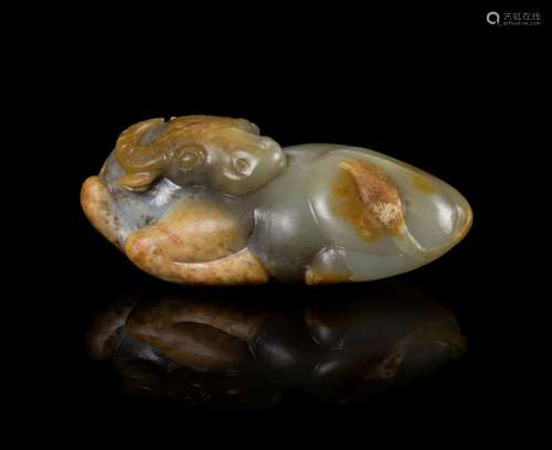 A Celadon and Russet Jade Figure of a Recumbent Buffalo