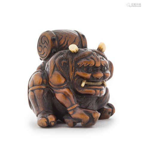 A Carved Boxwood Netsuke