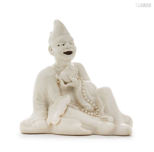 A White Glazed Porcelain Figure of an Immortal