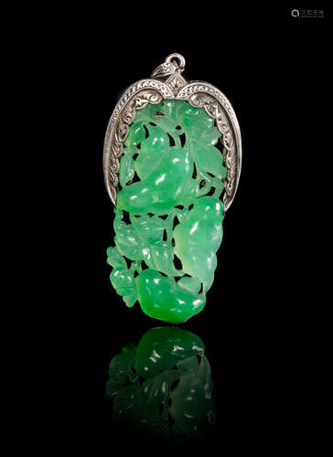 An Apple Green And Celadon Jadeite Pendant Length 1 3/4 inches.