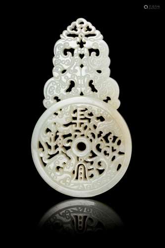 A Pierced and Carved Celadon Jade Plaque