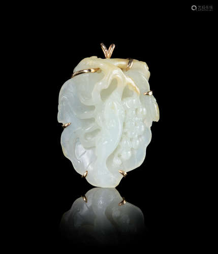 A Carved White Jade and 14K Gold Brooch