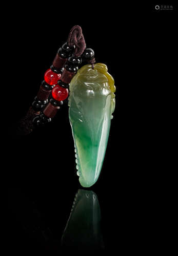 A Carved Jadeite Pendant