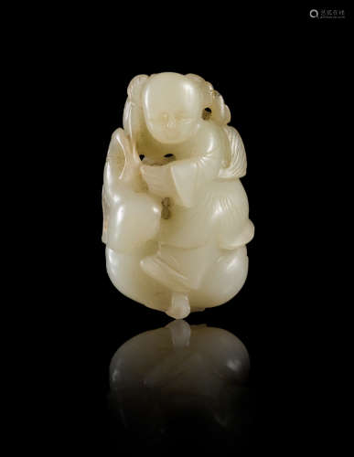 A Near-White Jade Figure of a Boy
