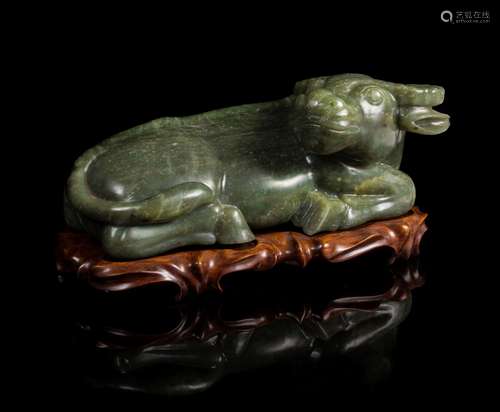 A Carved Spinach Jade Figure of a Water Buffalo