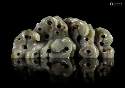 A Carved Grey Jade Brush Rest