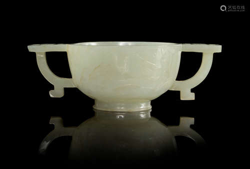 A Carved Pale Celadon Double Handled Cup