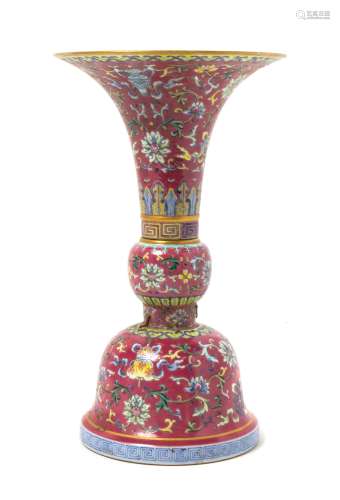 A Ruby-Ground Famille Rose Porcelain Gu -Form Vase Height 11 inches.