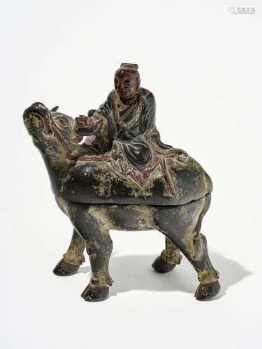 Lao tseu chevauchant son buffle, Chine, dynastie Qing (1644-1912)Bronze à patine brune, trace de polychromie, H 20,5 cm