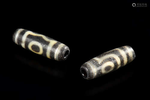 GROUP OF TWO DZI BEADS