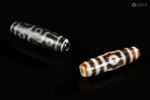 GROUP OF TWO DZI BEADS