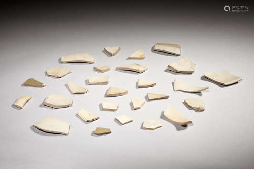 GROUP OF TWENTY-SEVEN DING WARE BROKEN PORCELAIN PIECES