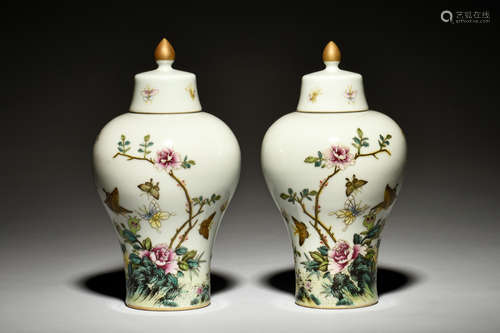 PAIR OF FAMILLE ROSE 'FLOWERS AND BUTTERFLIES' VASES WITH COVER