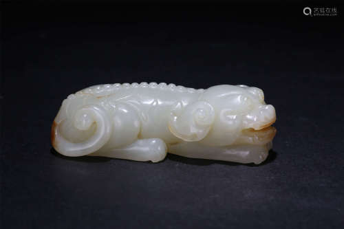 A Chinese Carved White Jade Foo Dog