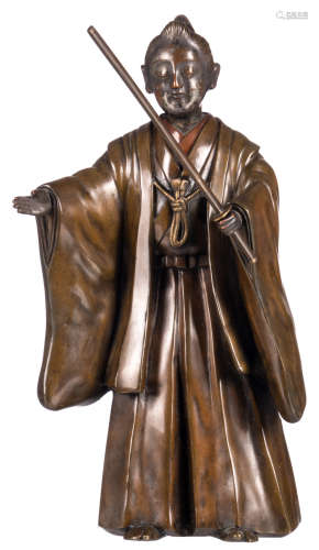 A Japanese patinated and silver plated bronze figure depicting a samurai, late Meiji period, H 22 cm