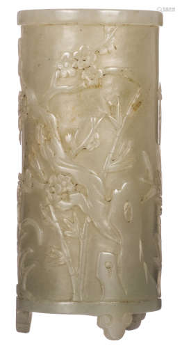 A Chinese jade brush washer, overall decorated with a bird and flower branches, 19thC, H 9 cm