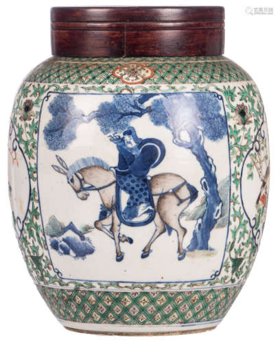 A Chinese blue and white and famille verte floral decorated ginger jar, the roundels with animated scenes and birds on flower branches, 19thC, with a wooden cover, H 26 cm