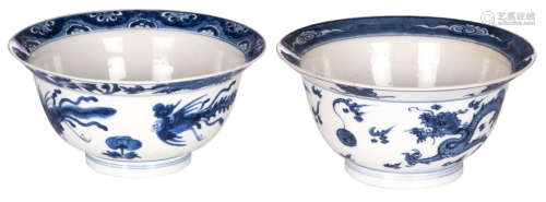 Two Chinese overall blue and white decorated bowls, one with dragons and flaming pearls, one with a phoenix; one with a Chenghua mark, H 7 - ø 15,5 cm
