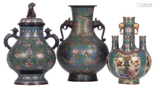 A Chinese cloisonné floral and relief decorated bottle vase and two ditto baluster shaped vases, two vases marked, H 33,5 - 40 cm