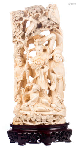 A Chineses ivory sculpture depicating an animated scene, first half 20thC, marked, on a matching wooden stand, H 30,5 (without stand) - 35 cm (with stand) - Weight: 1820g