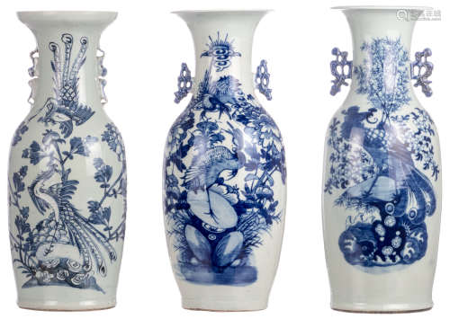 Three Chinese celadon ground blue and white decorated vases with birds and flower branches, H 58 - 59 cm