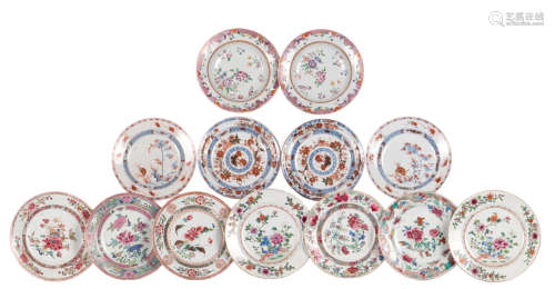 Nine Chinese famille rose floral decorated dishes, 18thC; added four Chinese Imari decorated dishes, 18thC, ø 22 - 23 cm