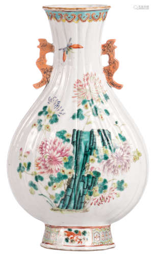 A Chinese famille rose bottle vase, decorated with flower branches, illegibly marked, H 34 cm