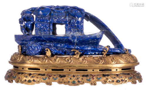 A Chinese lapis lazuli carved group depicting fisherman on a sampan, on a matching gilt bronze base, H 13 - W 23 - D 11 cm