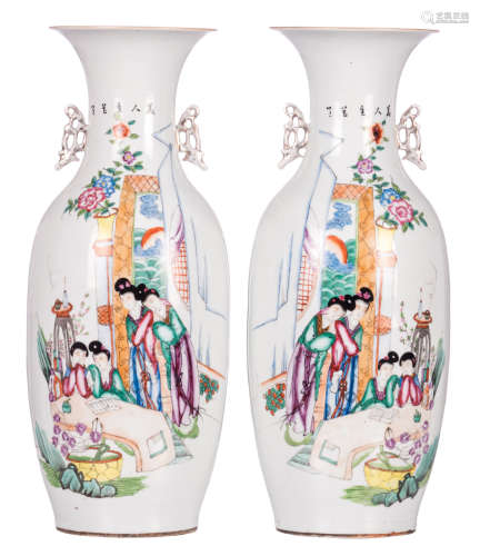 A pair of Chinese polychrome decorated vases with a gallant scene and calligraphic texts, H 57 cm