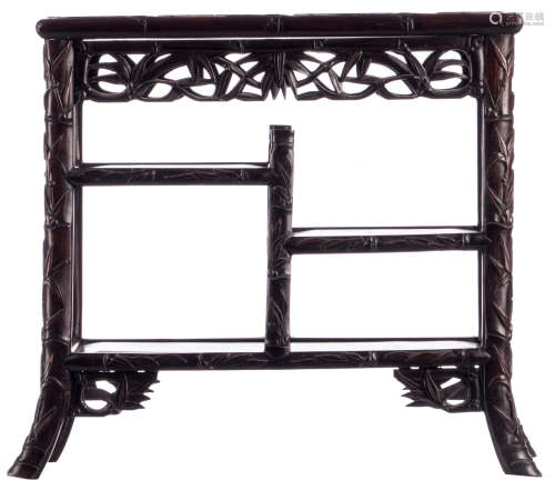 A Chinese huanghali hardwood occasional table, decorated with bamboo branches, Qing dynasty, H 50,5 - W 58 - D 31 cm