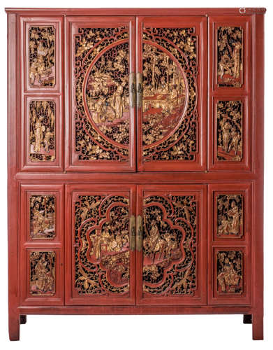 A Chinese richly carved painted and gilt wooden side cabinet, the doors and panels with animated scenes, H 179 - W 139 - D 50,5 cm