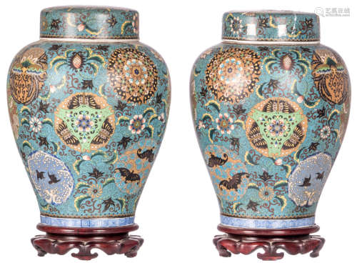 A pair of Japanese cloisonné floral and with birds and bats decorated jars and covers, marked, 19thC, on a matching wooden base, H 37 (without base) - 42,5 cm (with base)