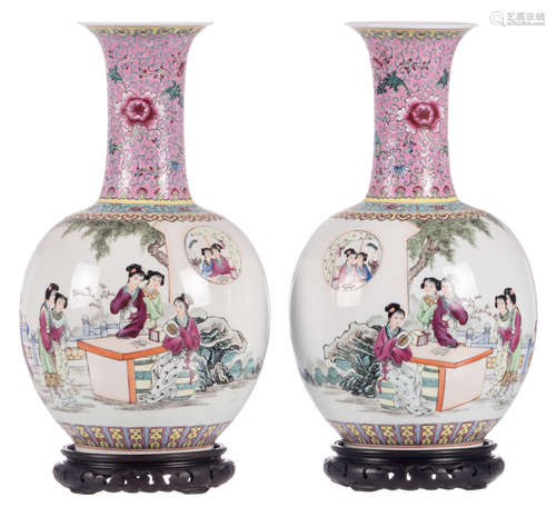 A pair of Chinese polychrome decorated bottle vases with a gallant garden scene, signed and marked, on a matching wooden stand, H 44 cm