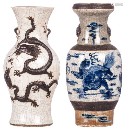A Chinese stoneware baluster shaped vase, crackleware with dragon relief decoration, marked; added a ditto blue and white vase, decorated with kylins, marked, H 44 - 46 cm