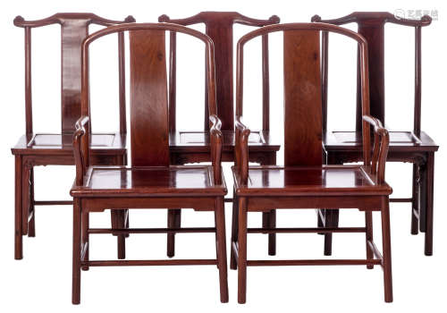 A pair of Chinese hardwood armchairs, H 96 - W 55,5 cm; added three ditto carved chairs with ruyi shaped stretchers, H 97 - W 52 cm