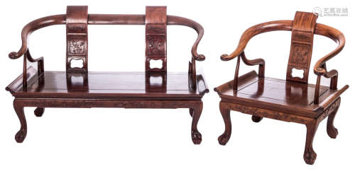 A Chinese carved hardwood bench and a ditto armchair with horseshoe shaped armrest, H 76 - W 68 - 122 - D 66 cm